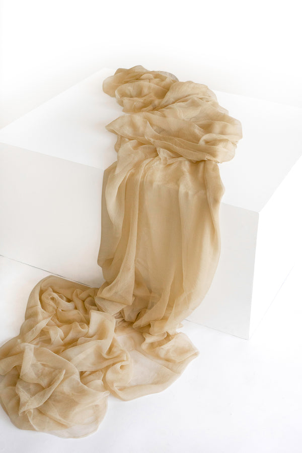 Tono + co Gossamer Silk Textile in Cream. Perfect for styling, tabletop design, detail work, or as a table runner. Find your inspiration through color and silk. Lovingly hand-dyed in Santa Ana, California and available in 24 signature colors. Check out our website for more styling, flat-lay, and color tips.