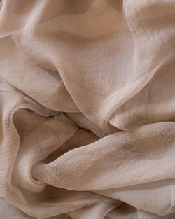 Tono + co Gossamer Silk Textile in Fawn. Perfect for styling, tabletop design, detail work, or as a table runner. Find your inspiration through color and silk. Lovingly hand-dyed in Santa Ana, California and available in 24 signature colors. Check out our website for more styling, flat-lay, and color tips.