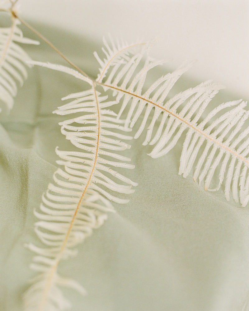 Tono + co Scout Silk Scarf in Sage. Lovingly hand-dyed in Santa Ana, California and available in 24 signature colors. Styled by Erica Kopp of Stay Co and photographed by Tess Comrie for our Spring 2019 Lookbook. Check out our website for more style and color inspiration.