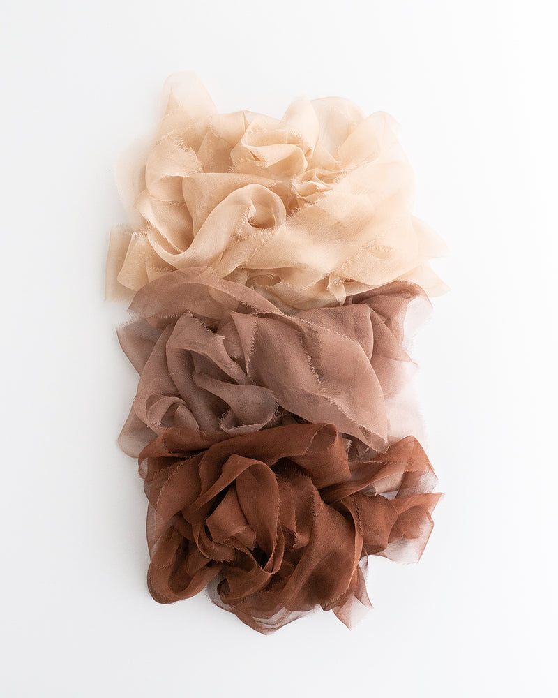 Tono + co Gossamer Silk Ribbon in Limited Edition 'The Color Beige.' Perfect for stationary styling, florals, and detail work. Find your inspiration through color and silk. Lovingly hand-dyed in Santa Ana, California and available in 24 signature colors. Check out our website for more styling, flat-lay, and color tips.