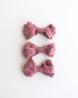 Tono + co Silk Ribbon Trim in Rose. Perfect for stationary styling, boutonnieres, and detail work. Find your inspiration through color and silk. Lovingly hand-dyed in Santa Ana, California and available in 24 signature colors. Check out our website for more styling, flat-lay, and color tips.