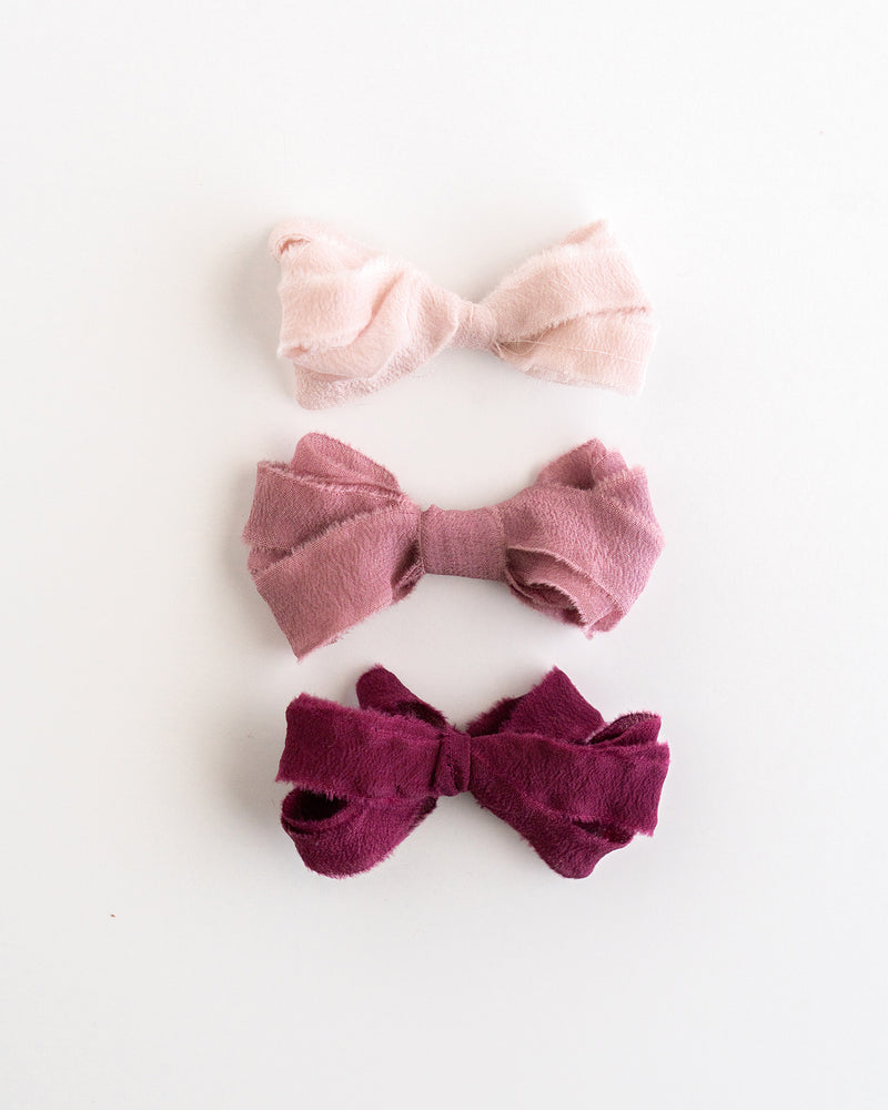Tono + co Silk Ribbon Trim in the Rouge Collection. Perfect for stationary styling, boutonnieres, and detail work. Find your inspiration through color and silk. Lovingly hand-dyed in Santa Ana, California and available in 24 signature colors. Check out our website for more styling, flat-lay, and color tips.