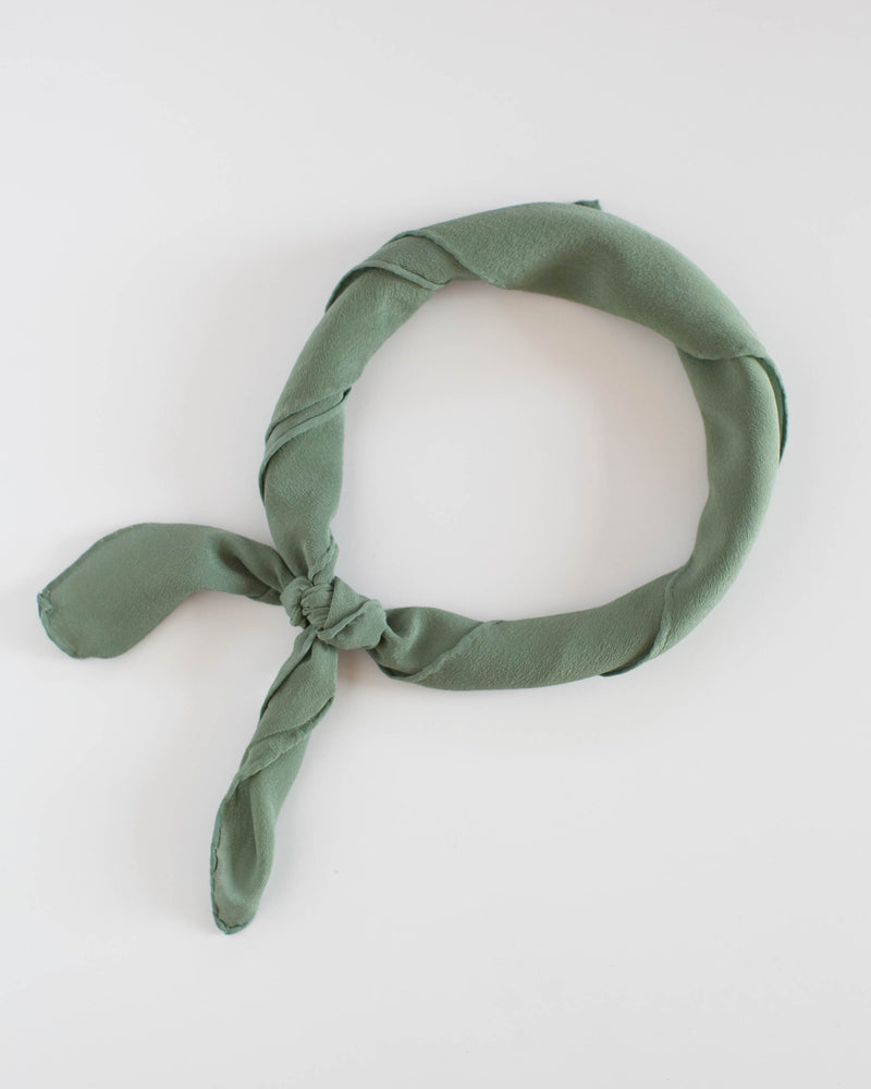 Tono + co Scout Silk Scarf in Fern. Lovingly hand-dyed in Santa Ana California and available in 24 signature colors. Check out our website for more style, color, and fashion inspiration.