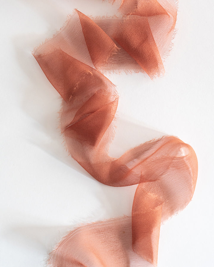 Tono + co Limited Edition Terra Cotta in Gossamer Silk Ribbon. View the new fall favorites featuring Champagne + Terra Cotta + Rust, lovingly hand-dyed in Santa Ana, California. Check out our website for more color, wedding, and styling inspiration.