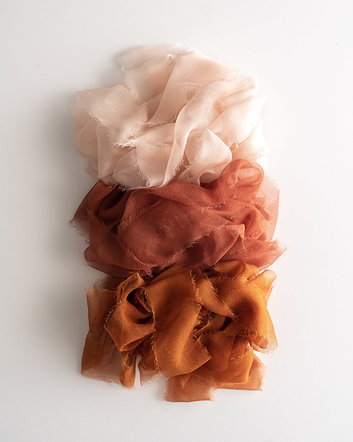 Tono + co Limited Edition 'The Color Orange' in Gossamer Silk Ribbon. View the new fall favorites featuring Champagne + Terra Cotta + Rust, lovingly hand-dyed in Santa Ana, California. Check out our website for more color, wedding, and styling inspiration.